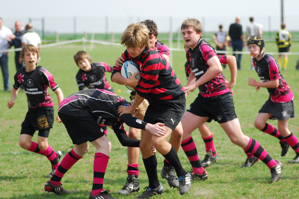 Rugby players competing during a club match